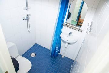 Фото номера Двухместный номер с 2 отдельными кроватями Хостелы Tamsalu Spordikompleksi Hostel г. Tamsalu 7